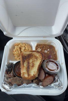 White Oak Smoked Brisket Texas Garlic Sausage Five Mac and Cheese Bourbon Brisket Baked Beans