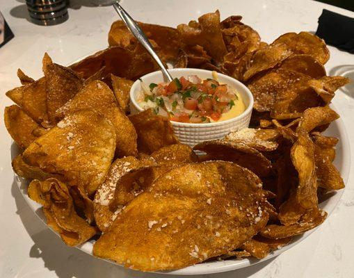 Bistro Chips Appetizer. House-made chips, cheese fondue, and pico de gallo. The fondue is very bland.