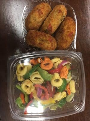 Crab cakes and tortellini salad.