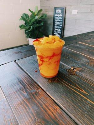 Mango Smoothie with mango pieces, chamoy and Tajin