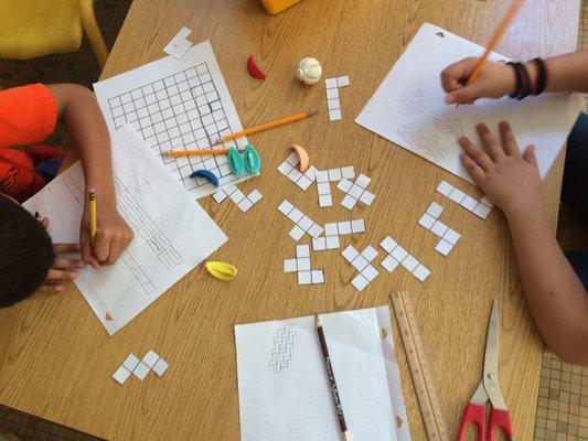 Puzzling with pentominoes.