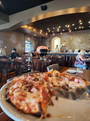 All meat pizza with a nice interior shot