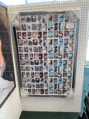 1978 Topps uncut Superman trading cards in frame