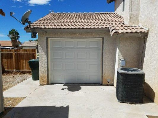 The back yard drive through garage.