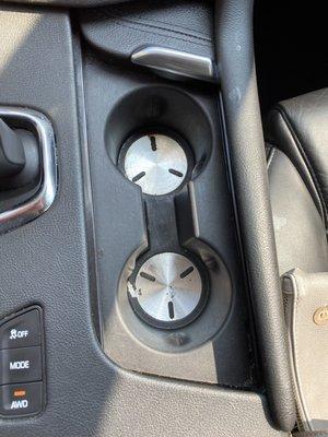 Dirty cup holders. You can still see my coffee spill on the leather and the passenger seat.