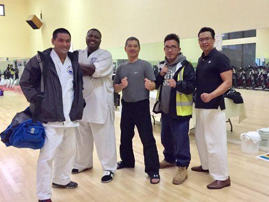 Sensei Nakamura (left) and Sensei Corpuz (center) with fellow students