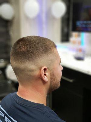 High skin fade with a beard line up