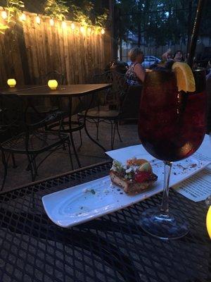 Sangria (average at best) with a bruschetta appetizer and awesome patio.