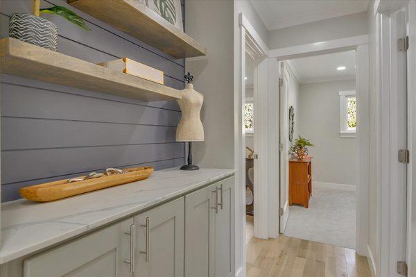 Great photos by professionals in addition to the right staging made this homes hallway even a selling point. Don't overlook small details!