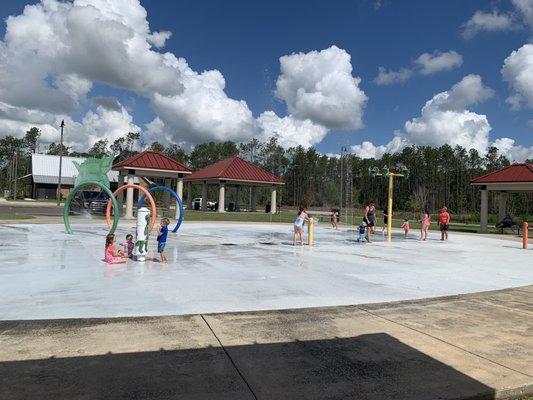 Splash pad adjacent to the play forts.