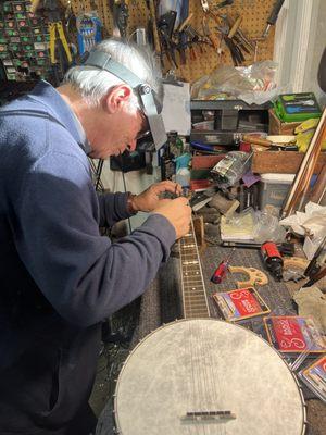 Master Craftsman Jonathan Goldstein at work. Restored 1927 Silvertone Banjo to like-new condition!