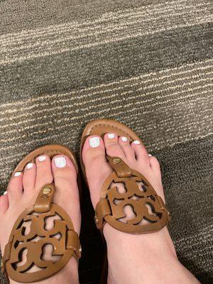 Oddly shaped pedi Qing bright white gel polish instead of the OPI funny Bunny color I requested.