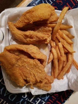 The perch was brownish beige and dripping in grease, heavily battered to hide the imperfections. The meat was extremely thin. Awful!