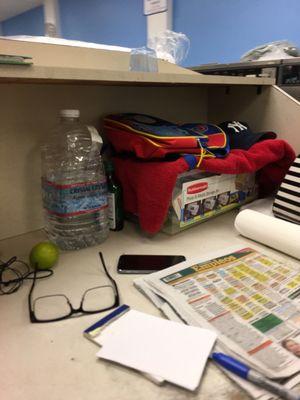 Attendant's bottle of hooch hidden next to his water