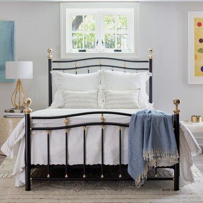 brass accents on painted beds!