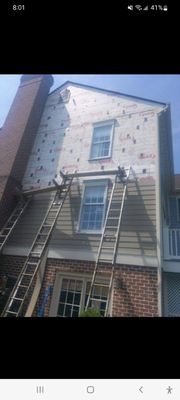 Siding up a tall house