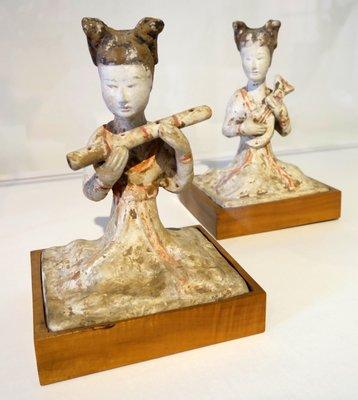 Pair of seated female musicians; China, Tang dynasty; 618-907; earthenware with painted polychrome decoration