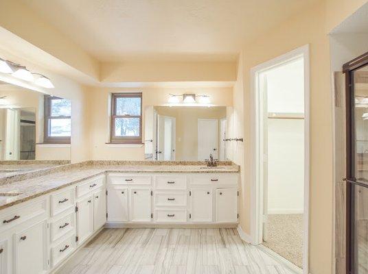 Master bathroom with custom cupboards