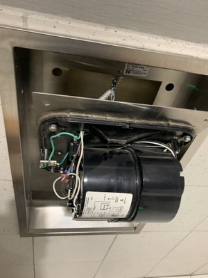 Troubleshooting electrical issue on a commercial hand dryer.