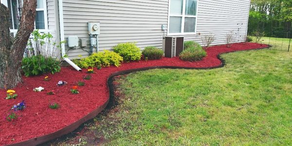 Out with the old, in with the new. Fresh Mulch. Plus New Border