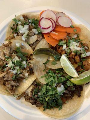 Tacos clockwise: carnitas, adobada, asada, (carnitas again) - solid decent tacos