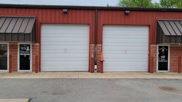 Shop with 2 garage bays.