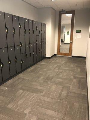 Lockers for personal belongings located outside entrance to test area