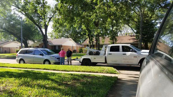 Jose dropping off my car at our house after a towing.