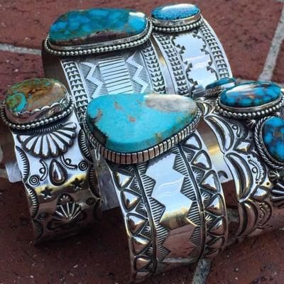 Massive heavyweight sterling silver cuffs featuring rare turquoise from southwestern states