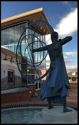 "Aiming for the Mark" pond statue.