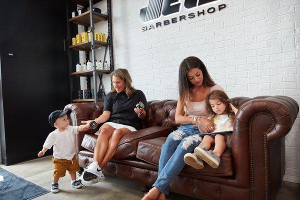 Hanging out and waiting on Dad and brothers getting a fresh cut!