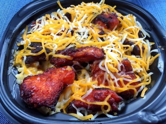 Chicken and rice bowl. (Roasted chicken, rice, beans, and cheese)