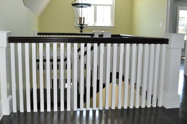 contemporary staircase with custom stair parts by Splash Carpentry, Chicago IL