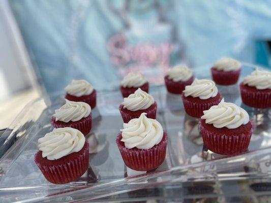 Red velvet cupcakes with cream frosting