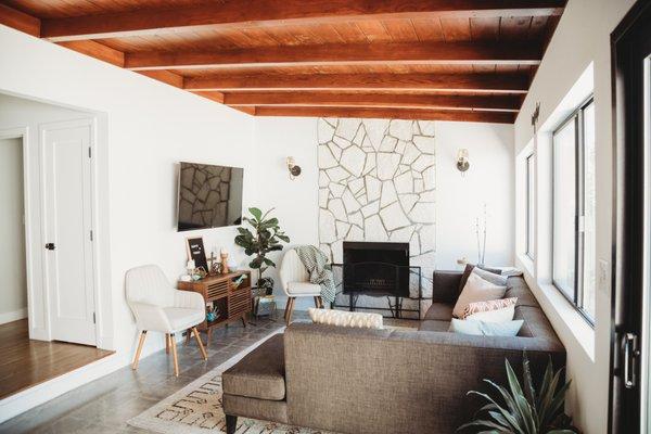 Fireplace renovation made to feel original and updated with flagstone.