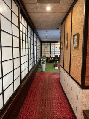 The restroom hallway, plus tiny indoor garden