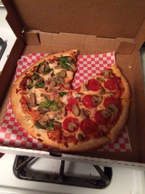 I ate a piece!! good pizza mushroom/pepperoni one side and spinach/mushroom on other! hot and delicious!