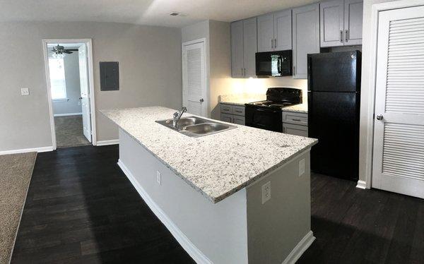 Oversize kitchen islands that are great for entertaining.