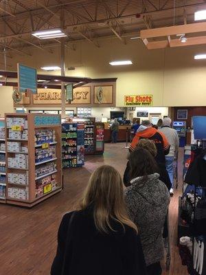 40 minute wait at the Forest Hills Kroger.  Only 2 techs assisting  patients.  The line was out into the grocery checkout lane area.