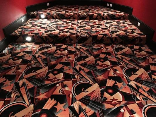 Patterned Carpet installed in a small theater room.