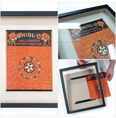 The custom frame design displays and preserves the cardboard antique, while allowing the option for game play.