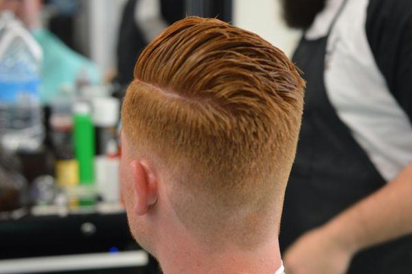 smooth fade with a finger style on top by marco the barber