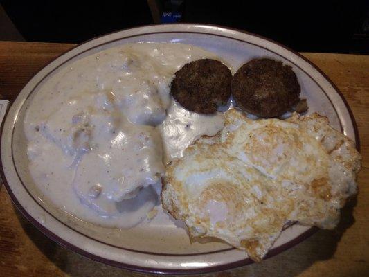 1/2 biscuit and gravy, eggs and sausage, breakfast.