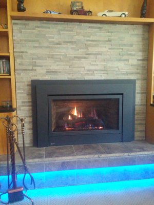 Gas Fireplace Insert Conversion from wood. Custom Tile Surround and LED Accent Lighting.