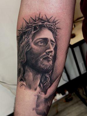 Black and grey religious tattoo