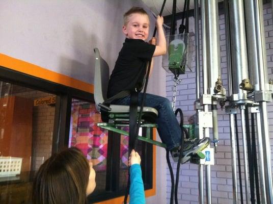 Kids can use their muscles and pulleys to raise their chair