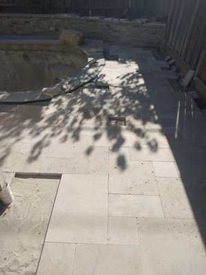 Travertine floor, pool deck  installation