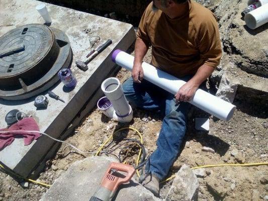 Installing a 1000 gallon grease trap.