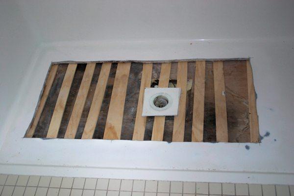 A large unsupported shower floor was repaired and saved the customer thousands