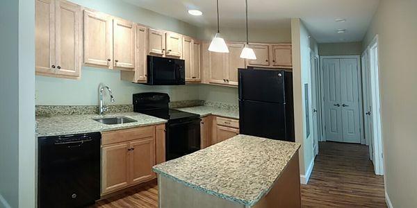 1 of 40 apartment kitchen with appliances we recently completed.